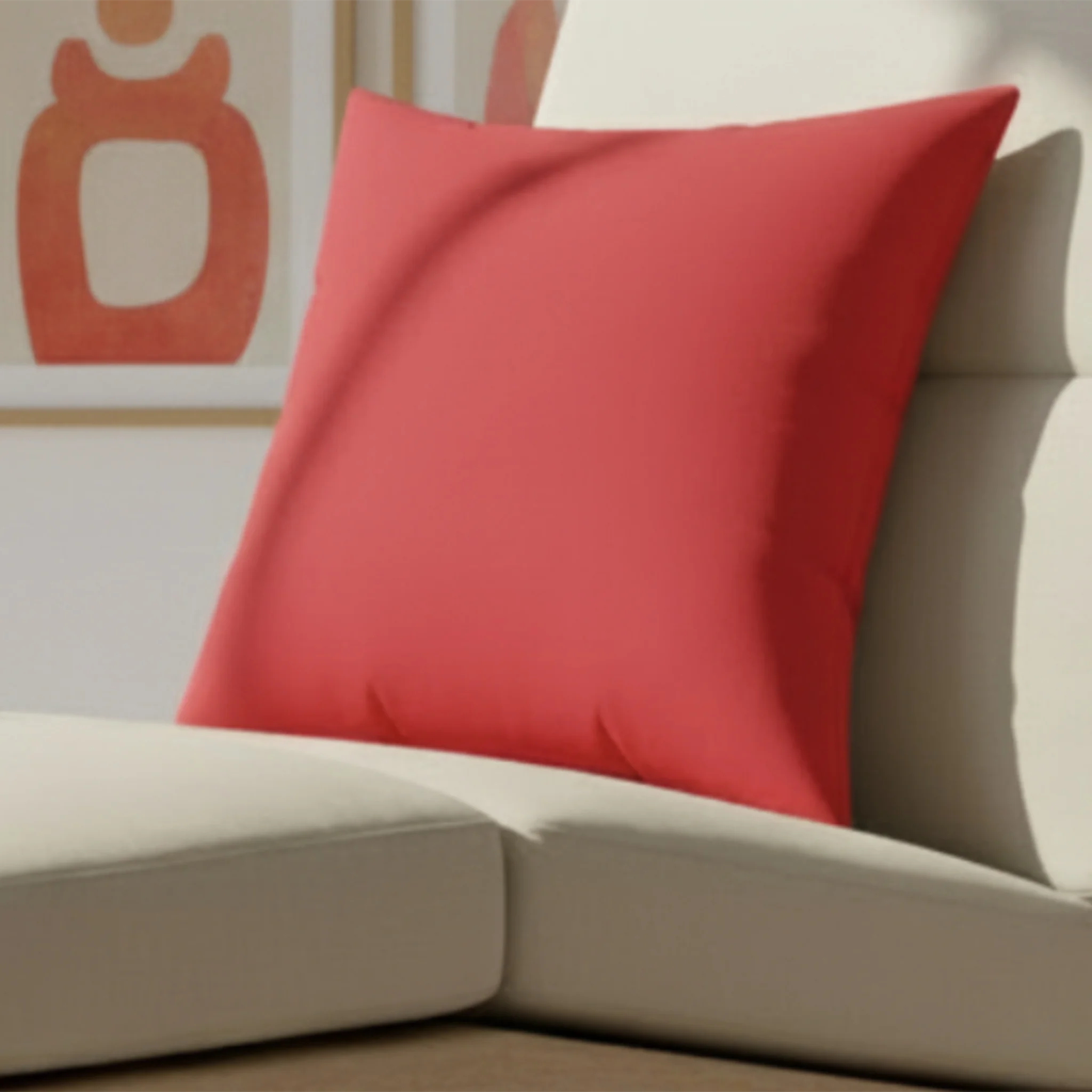 Traditional red faux suede pillow styled on sofa, bold classic red home decor.
