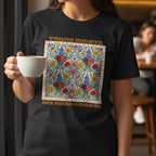 Black Trans Rights Are Human Rights floral graphic tee worn by a woman holding a coffee cup in a coffee shop, front view.