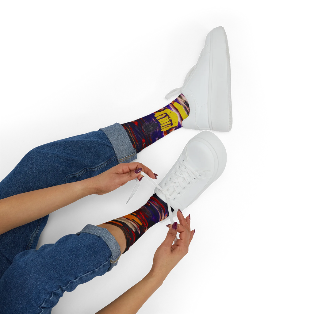 All-over print crew socks with abstract Tribal Wave art worn with white sneakers, person lacing up, lifestyle view.