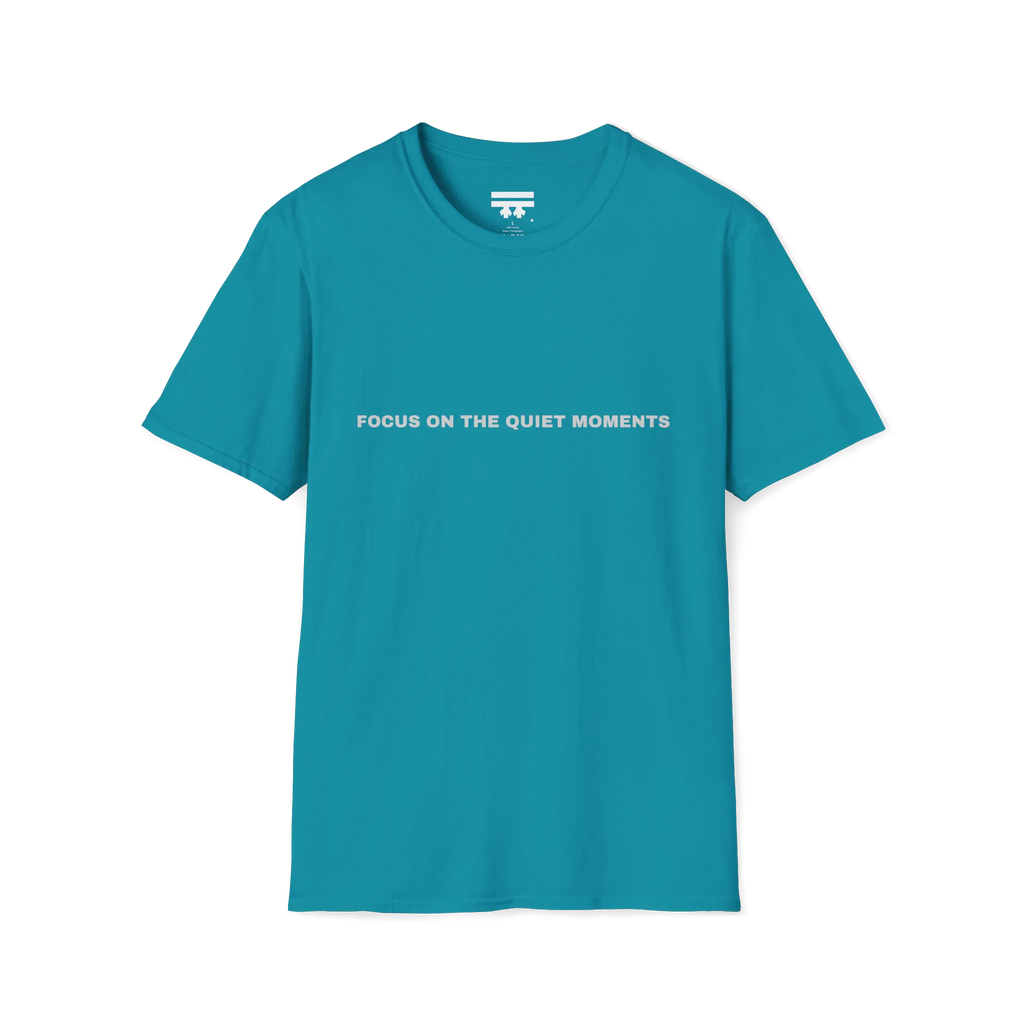 A tropical blue t-shirt with grey Focus On The Quiet Moments text on the chest.