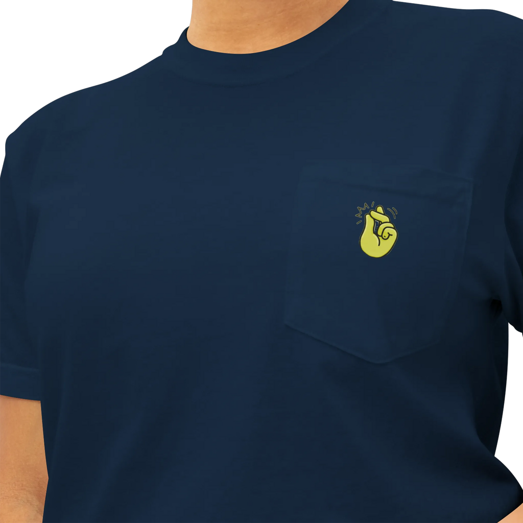 A person wearing the true navy clock it pocket t-shirt with a yellow Clock It Motif on front left chest pocket shown up close.