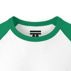 Close-up of the Kelly green collar and inner neck of a white raglan shirt, showing a black FREEBRD logo.