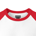 Close-up of the red collar and inner neck of a white raglan shirt, showing a black FREEBRD logo.