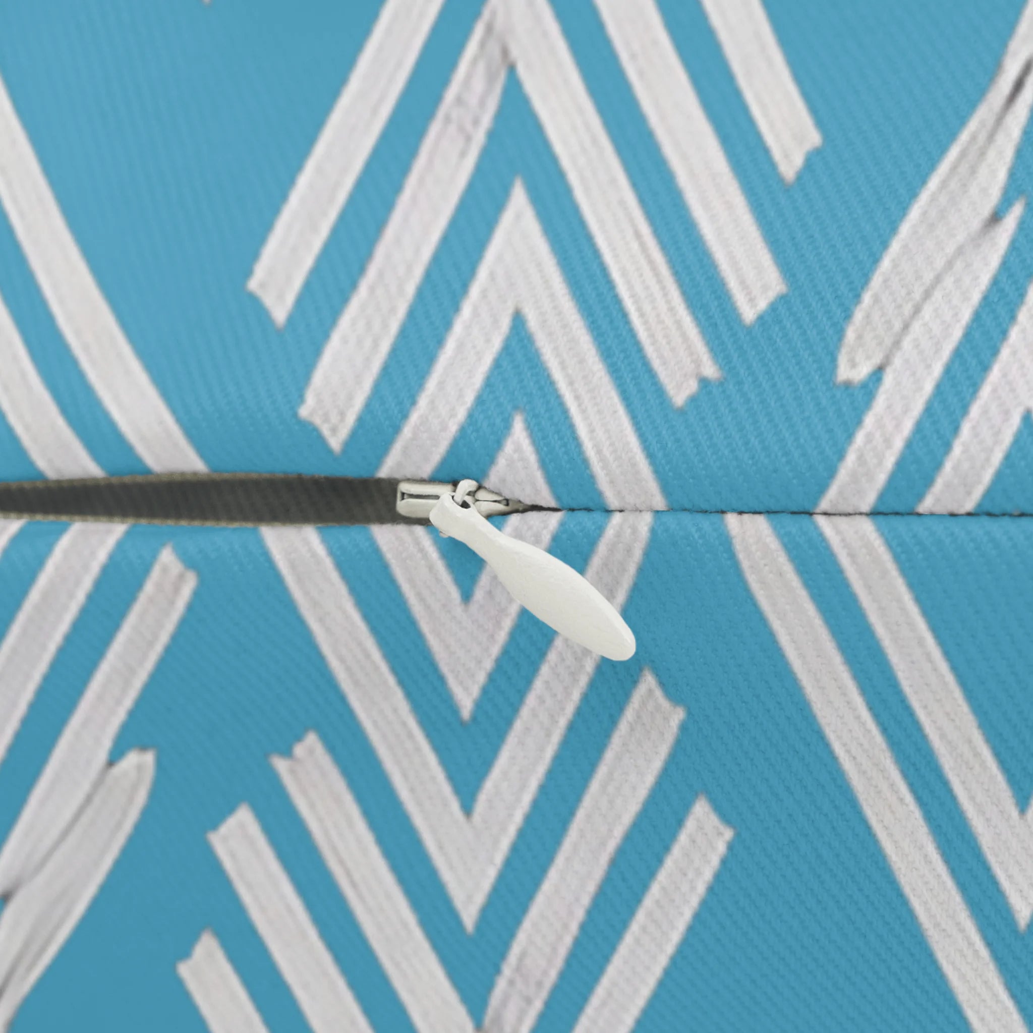 Vintage Aqua ikat lumbar accent pillow, zipper view.