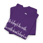 Purple cotton tee upper-chest and collar detail showing the ribbed neckline and partial white handwritten lettering.
