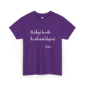 Purple cotton tee with white handwritten lettering reading “We belong to the earth; the earth doesn't belong to us!” with “— Aukan” below, front view.