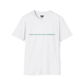 A white t-shirt with sage green Focus On The Quiet Moments text on the chest.