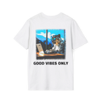 A white t-shirt featuring a snow leopard in sunglasses at a laptop graphic with black Good Vibes Only text on the back.