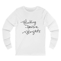 White Bella Thinking Positive Thoughts long sleeve tee, handwritten graphic, crew neck, front view.
