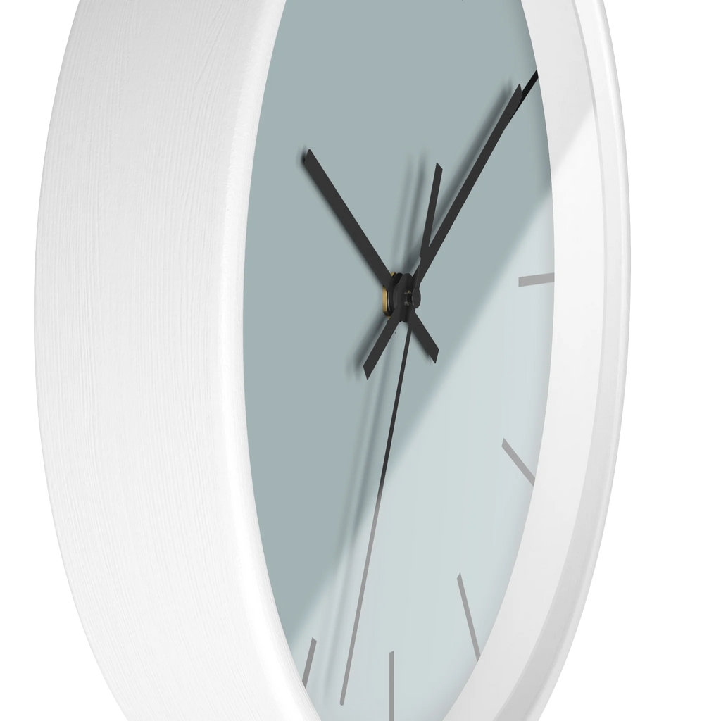 Cool silver silent wall clock, white base, black hands, black markers, 10 inch, side view.
