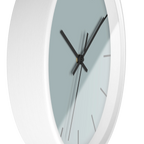 Cool silver silent wall clock, white base, black hands, black markers, 10 inch, side view.