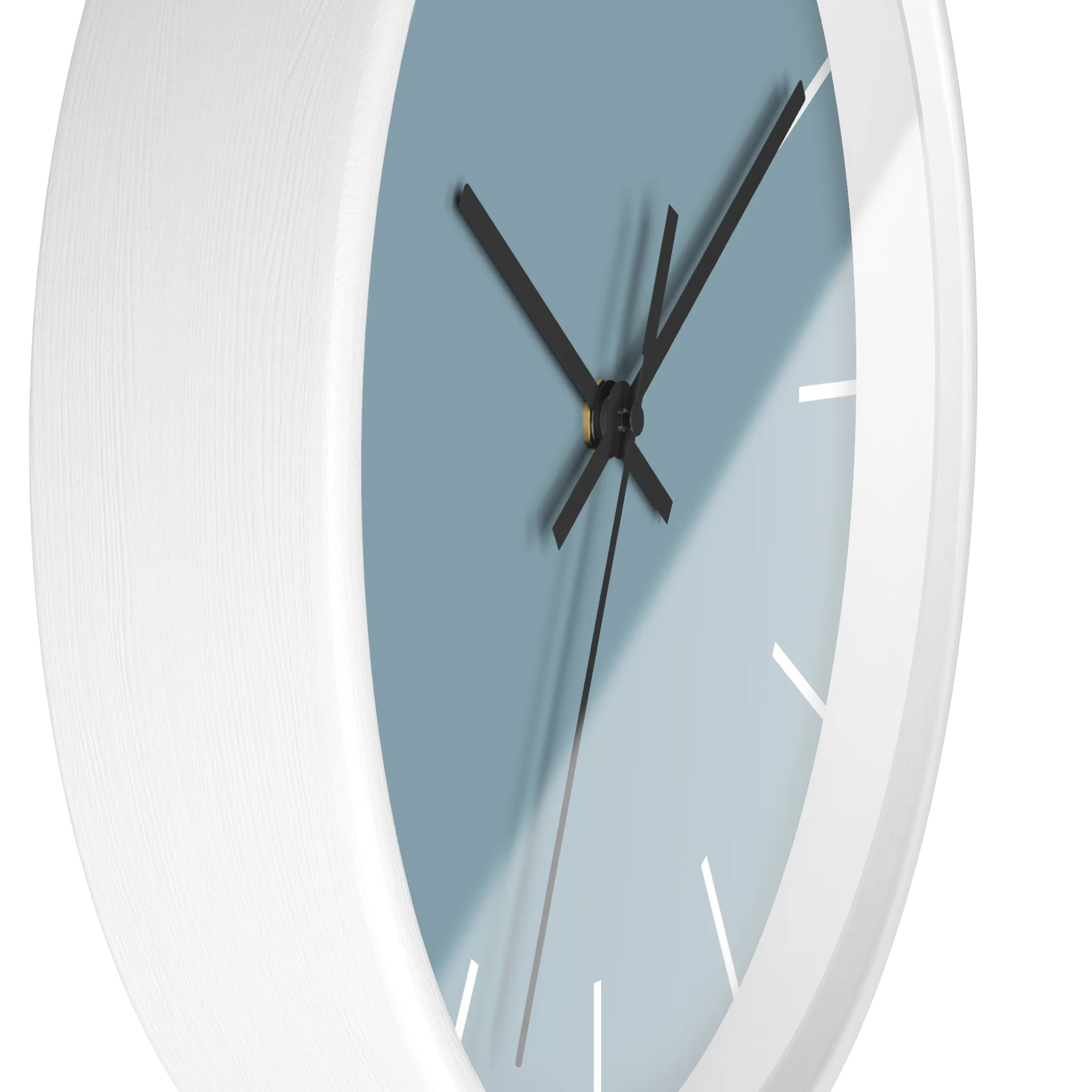 Danish blue minimalist wall clock with white wooden base, black hands, and white markers, side view.