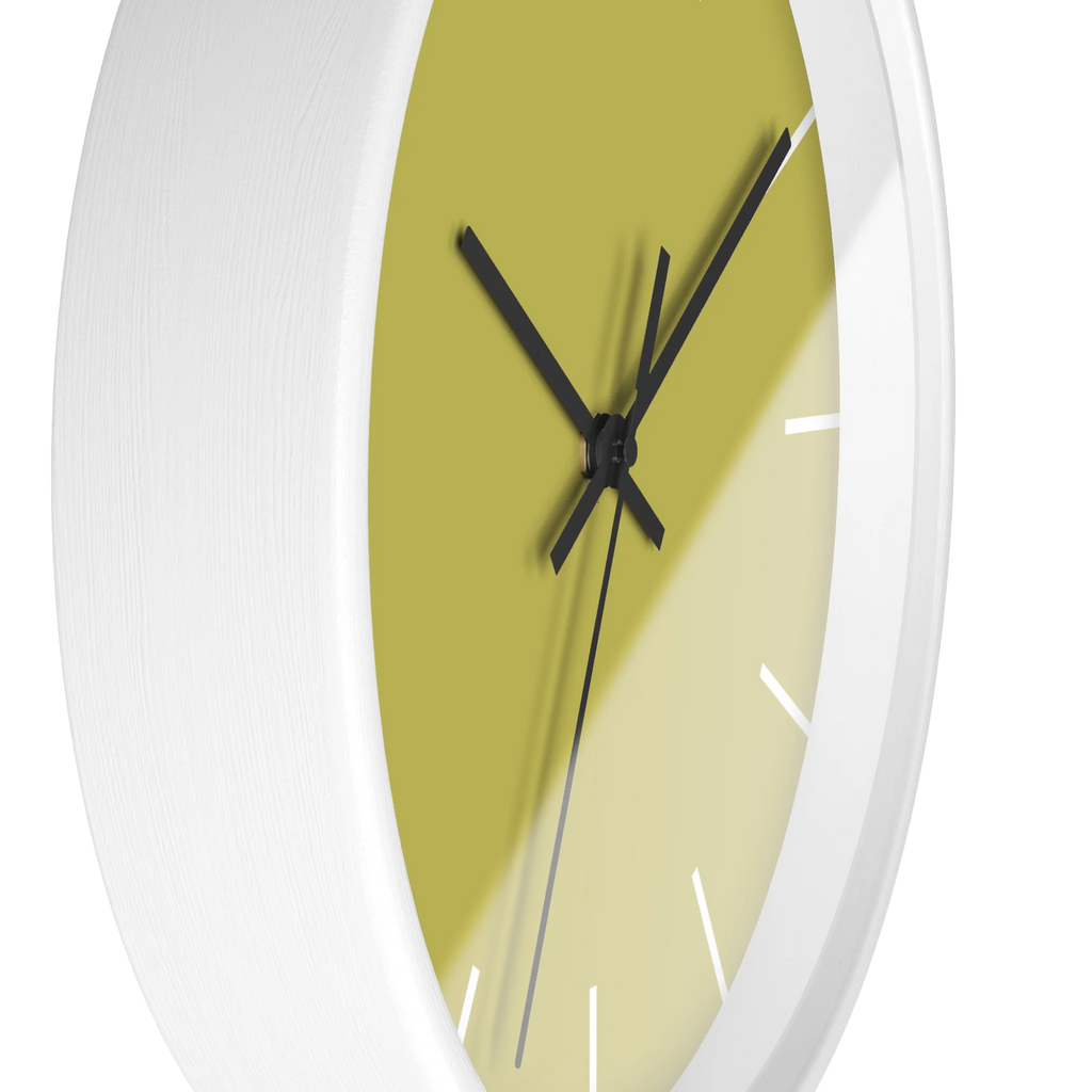 Dull gold yellow silent wall clock, white base, black hands, white markers, 10 inch, side view.