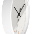 Off white silent wall clock, white base, black hands, light brown markers, 10 inch, side view.