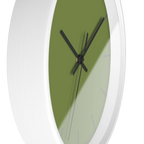Olive green silent wall clock, white base, black hands, dark grey markers, 10 inch, side view.