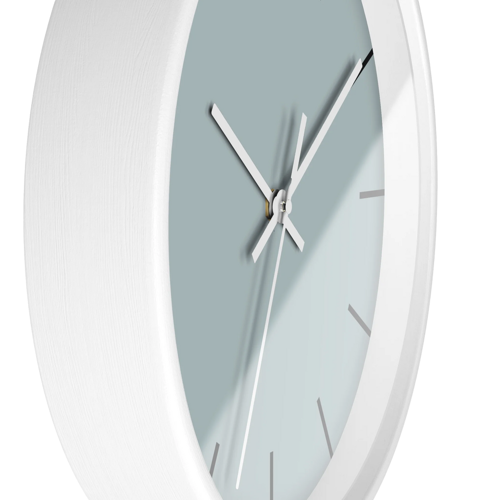 Cool silver silent wall clock, white base, white hands, black markers, 10 inch, side view.