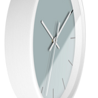 Cool silver silent wall clock, white base, white hands, black markers, 10 inch, side view.