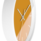 Dixie orange silent wall clock, white base, white hands, white markers, 10 inch, side view.