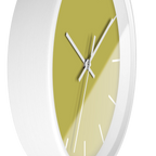Dull gold yellow silent wall clock, white base, white hands, white markers, 10 inch, side view.