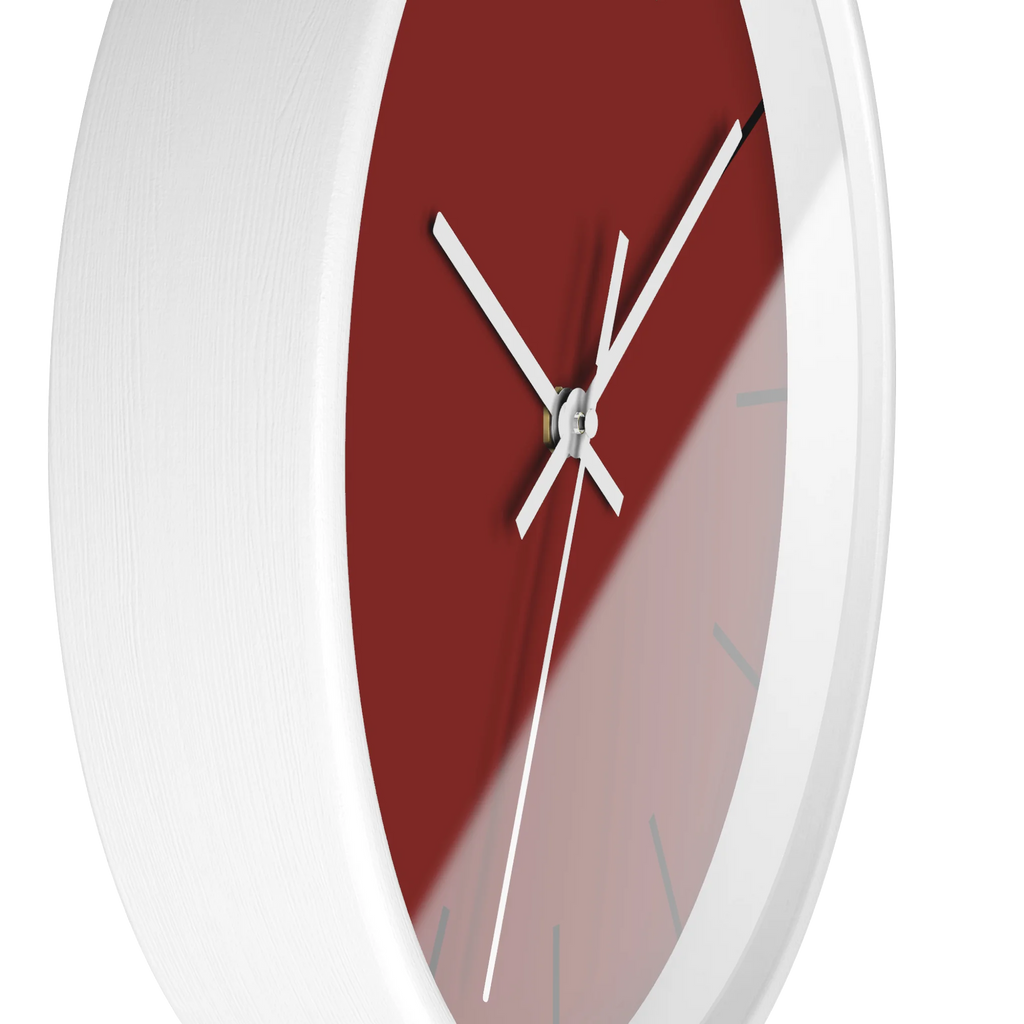 Maroon bloodstone red silent wall clock, white base, white hands, black markers, 10 inch, side view.