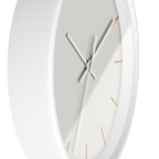 Off white silent wall clock, white base, white hands, light brown markers, 10 inch, side view.