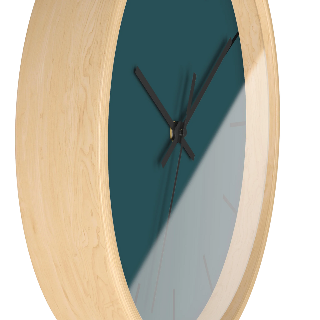 Abstract teal silent wall clock, wooden base, black hands, black markers, 10 inch, side view.