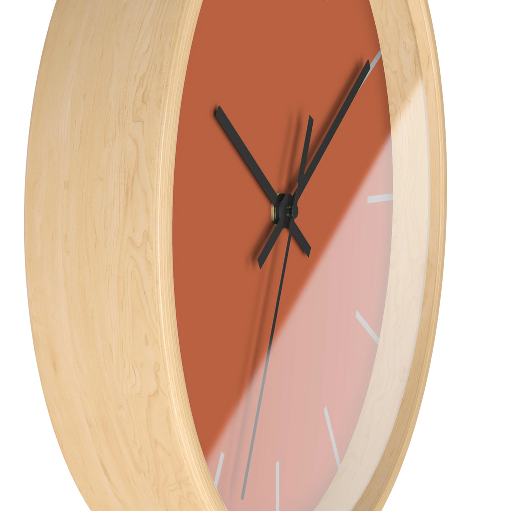Boho rust orange silent wall clock, wooden base, black hands, light grey markers, 10 inch, side view.