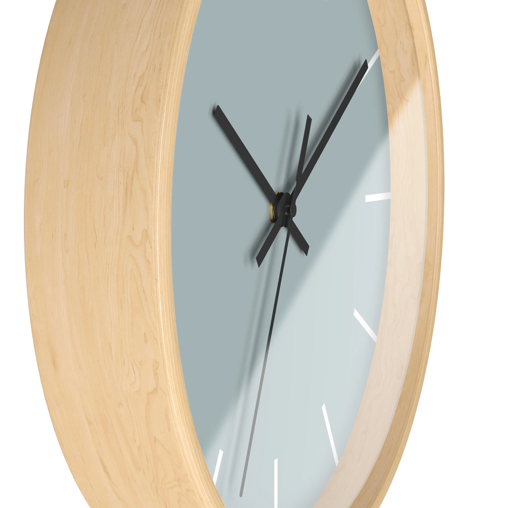 Cool silver silent wall clock, wooden base, black hands, white markers, 10 inch, side view.