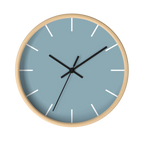 Danish blue minimalist wall clock with natural wooden base, black hands, and white markers, front view.