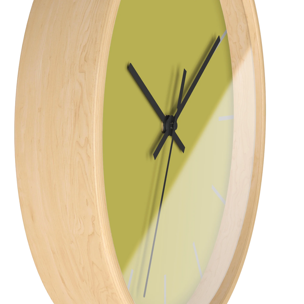 Dull gold yellow silent wall clock, wooden base, black hands, light grey markers, 10 inch, side view.