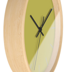 Dull gold yellow silent wall clock, wooden base, black hands, light grey markers, 10 inch, side view.