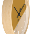 Gold ochre mustard silent wall clock, wooden base, black hands, white markers, 10 inch, side view.