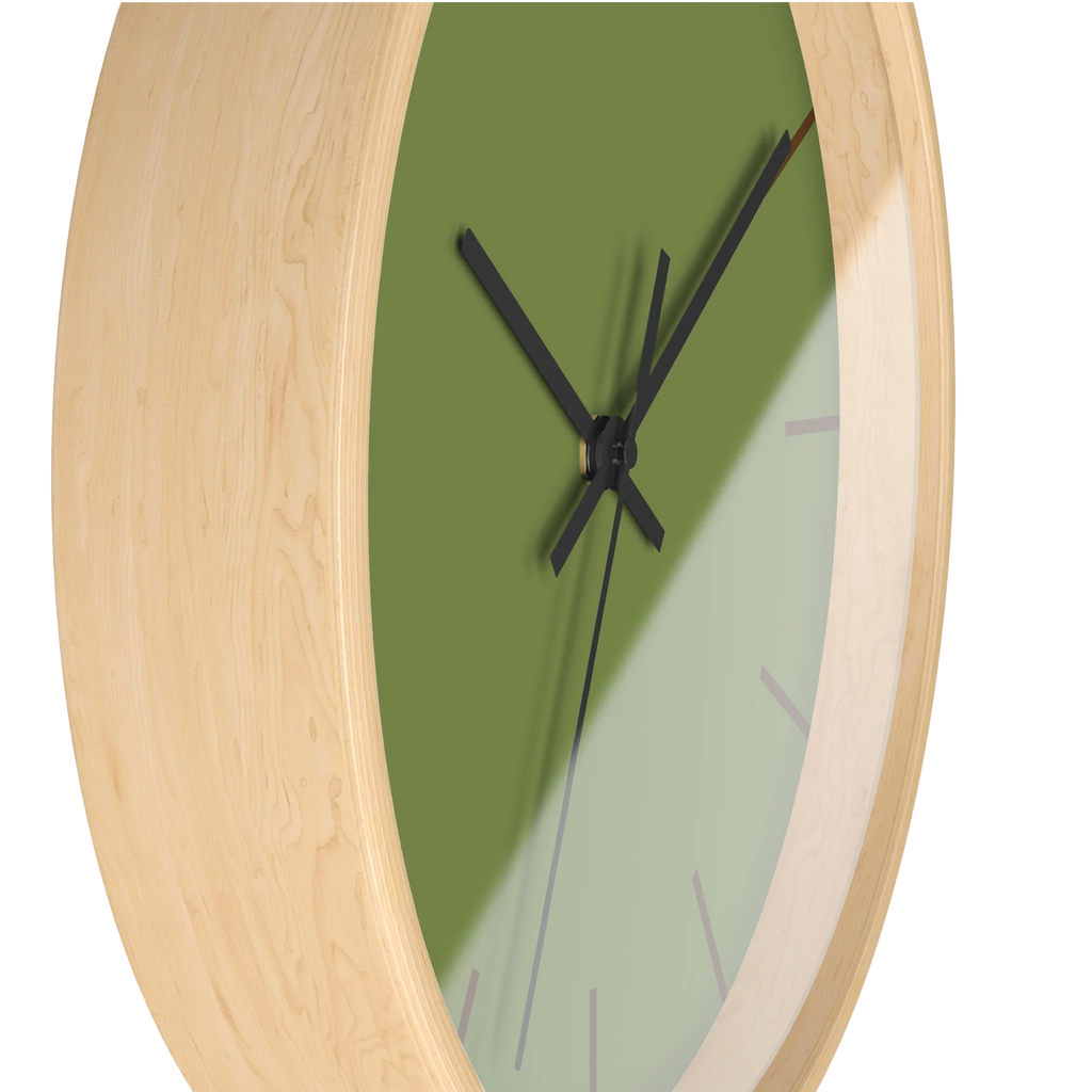Olive green silent wall clock, wooden base, black hands, saddle brown markers, 10 inch, side view.
