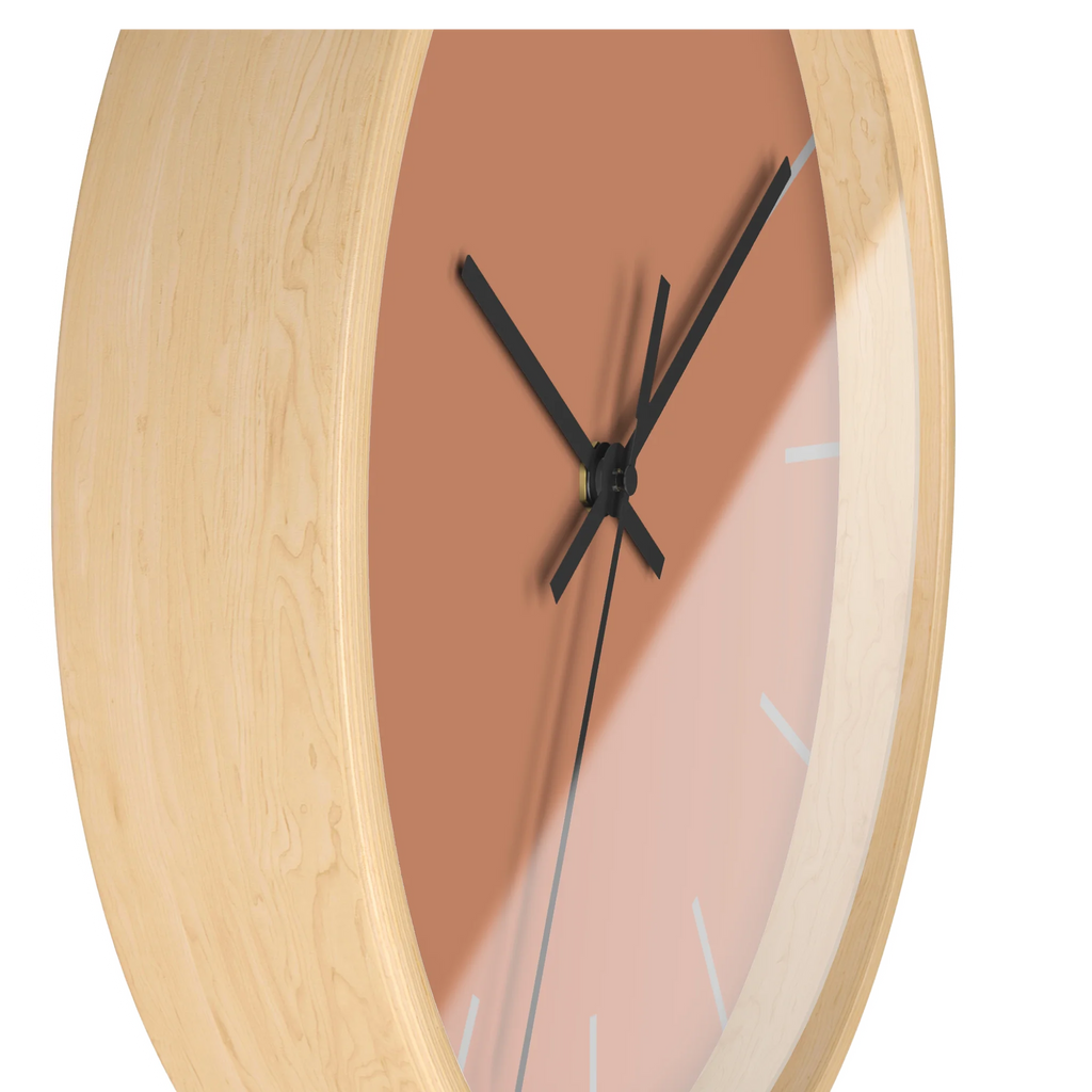 Vintage salmon silent wall clock, wooden base, black hands, light grey markers, 10 inch, side view.