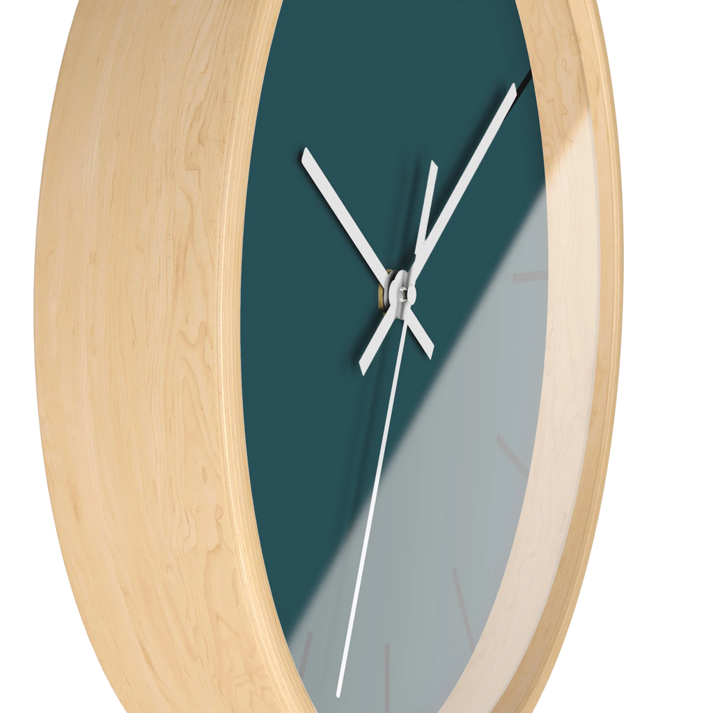 Abstract teal silent wall clock, wooden base, white hands, black markers, 10 inch, side view.