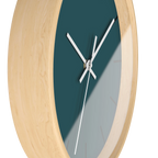 Abstract teal silent wall clock, wooden base, white hands, black markers, 10 inch, side view.