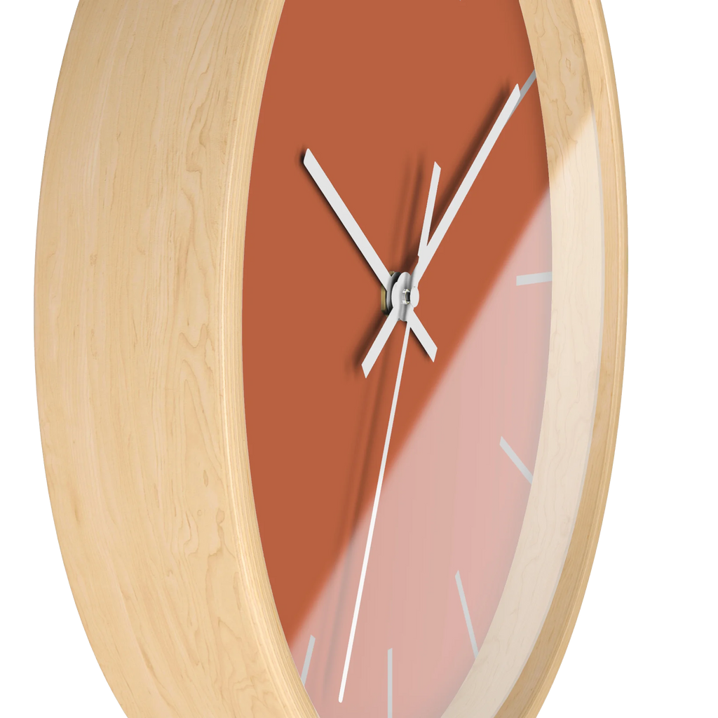 Boho rust orange silent wall clock, wooden base, white hands, light grey markers, 10 inch, side view.