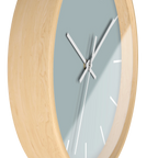 Cool silver silent wall clock, wooden base, white hands, white markers, 10 inch, side view.