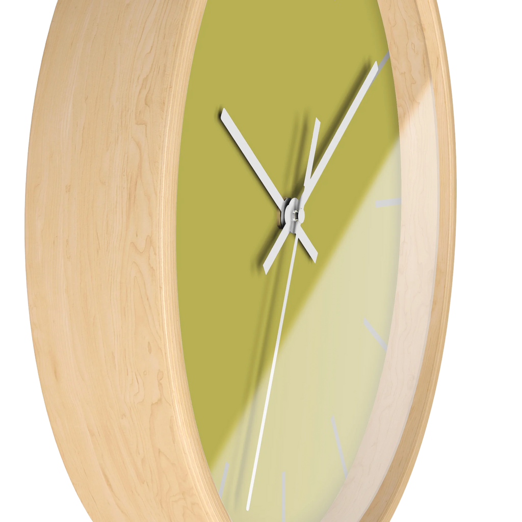 Dull gold yellow silent wall clock, wooden base, white hands, light grey markers, 10 inch, side view.