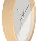 Off white silent wall clock, wooden base, white hands, light grey markers, 10 inch, side view.